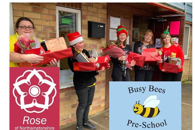Busy Bees Pre-School staff at Christmas with hampers donated by grateful parents of pupils