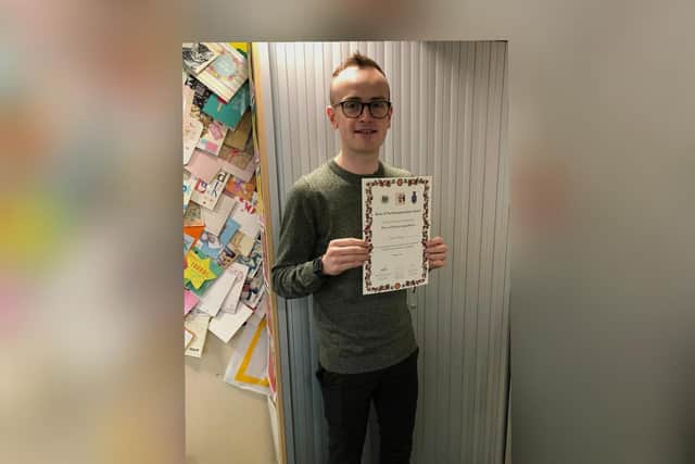 Callum with his award.