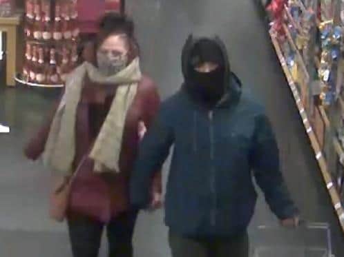 Police want to speak to this pair about the robbery at Wellingborough's M&S store