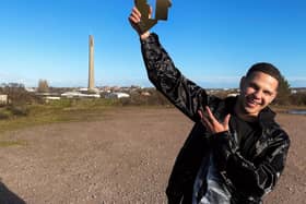 slowthai celebrating with his award for Tyron taking the top spot in the Official Albums Chart. (Photo OfficialCharts.com)
