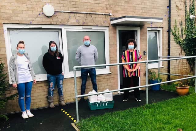 Daren and team delivering to the Corby Homeless Project with staff member Lydia McShefferty