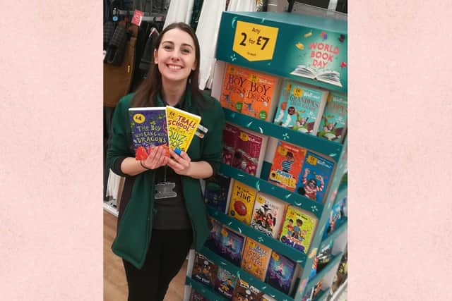 Skye Summerton with some of the books