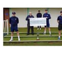 l-r  Martin Prowse, Persimmon Homes Midlands adoptions co-ordinator Brian Penn, James Coles, Loddington and Mawsley Cricket Club captain Liam Flecknor, and Calum Plowright.