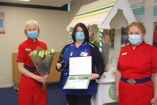 Community midwife Linda Concannon receives her award from Director of Nursing and Quality Leanne Hackshall (L) and Deputy Director of Nursing and Quality, Diane Postle (R)