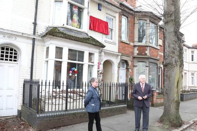 Keli Watts with Paul Ansell (Kettering Civic Society) with Mick Scrimshaw watching on