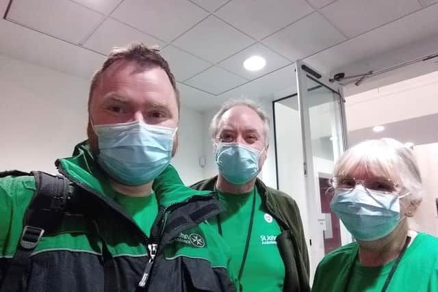 Vaccination volunteer Peter Shergold with his parents – and fellow vaccination volunteers – David and Jayne Shergold
