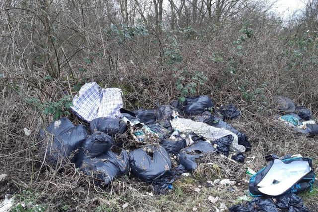 Around three tonnes of fly-tipping in fields by the A605 near Lilford were the first to be cleared as part of the Northamptonshire police, fire and crime commissioner's scheme