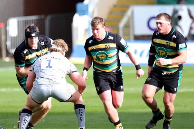 Reece Marshall (centre) in action against Sale (picture: Peter Short)