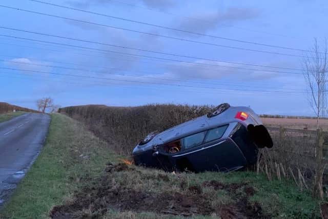 The driver walked away uninjured after his vehicle ended up upside down in a ditch. Photo: @WellingbSC