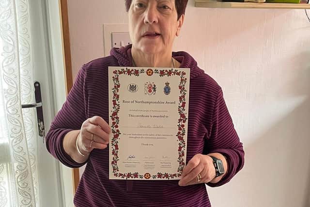 Jeanette with her certificate