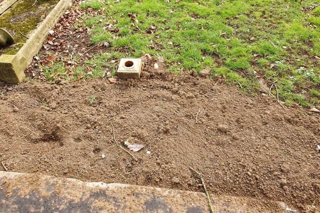 The soil on the grave