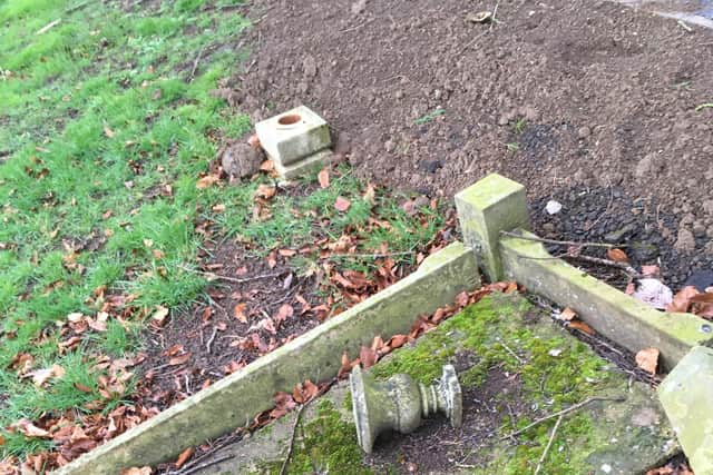 The 10inch by 10 inch memorial at the top of the photo with soil from the works