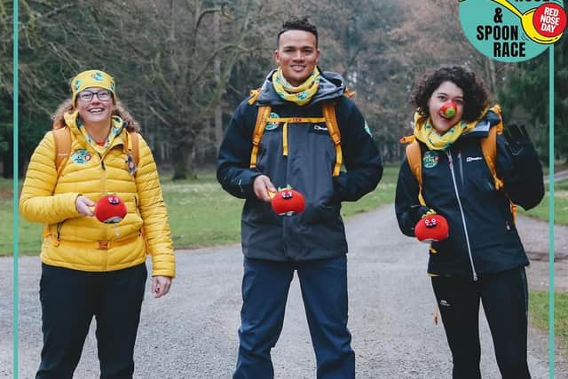 Claire (in the yellow coat) in the challenge.