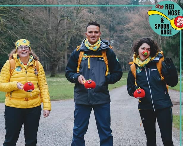 Claire (in the yellow coat) in the challenge.