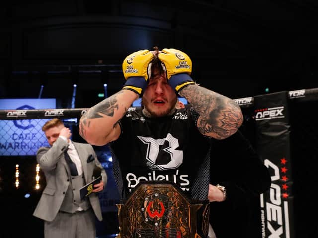 Emotions were running high for Jordan Vucenic after he won the Cage Warriors featherweight title. Pictures courtesy of Dolly Clew (www.dollyclew.com)