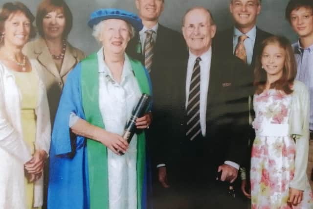 Gina with her family after being awarded an honoury fellowship from the University of Northampton.