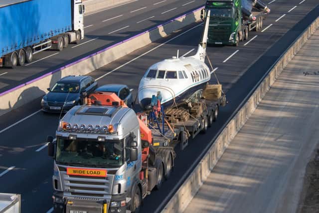 The plane headed up the M1 on the back of a lorry from its former home near Milton Keynes