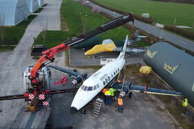 The Jetstream's wings are reattached after 'landing' back in Northamptonshire
