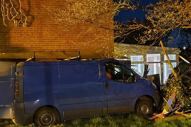 The van that ended up in the side of the house