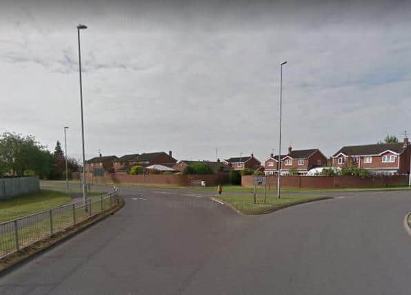 The roundabout exit has metal barriers on one side of Lewin Road, but not the other