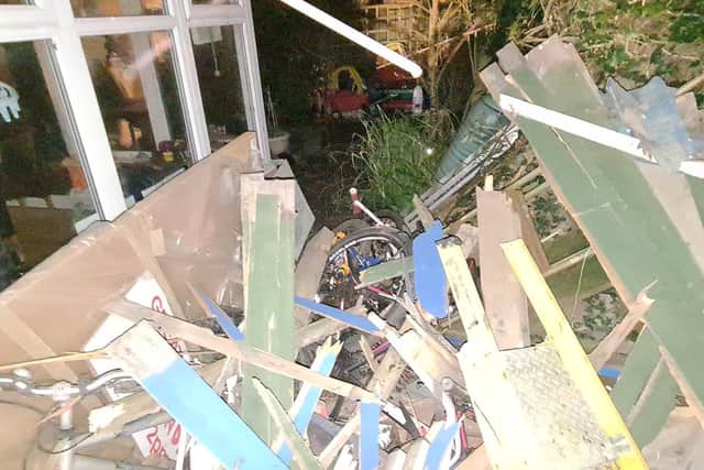 The van ran into a fence and narrowly avoided the conservatory