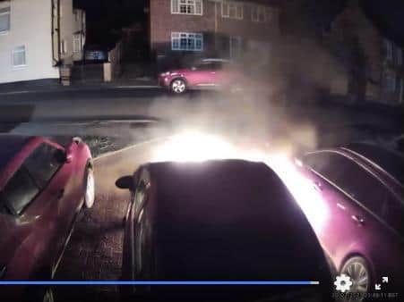 Two cars were destroyed and another badly damaged in the blaze