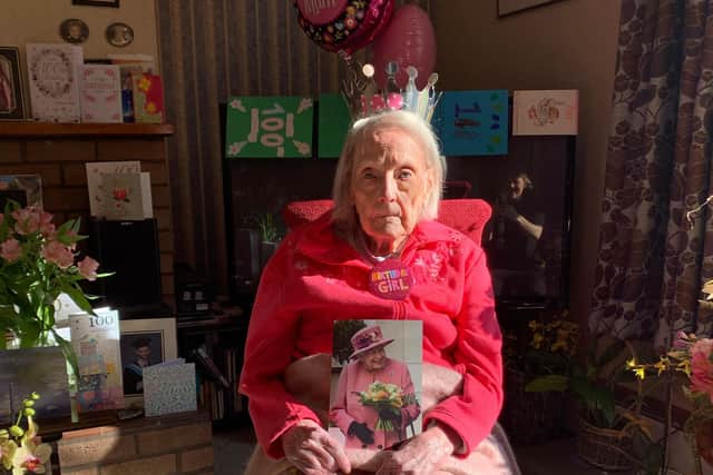 Meg with her card from HM The Queen