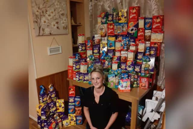 Suzanne Holland with some of the eggs she handed over.