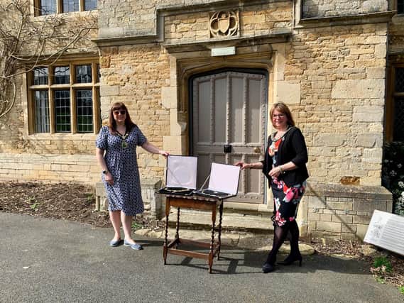 The handover of the chains outside Rushden Hall