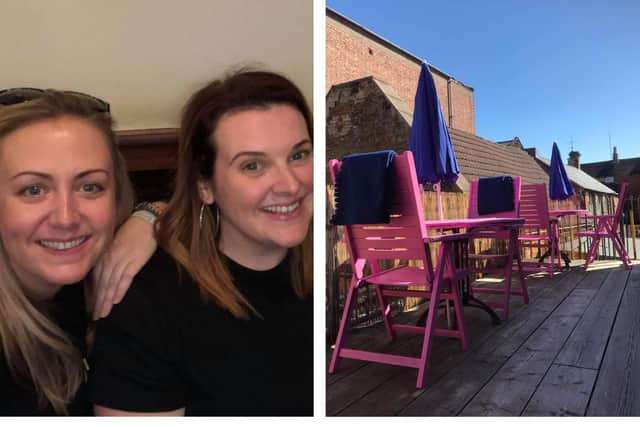 Laura (left) and Sam (right), and The Wine Room's outdoor balcony