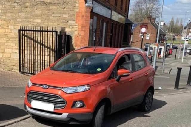 The stolen red Ford Ecosport Titanium Turbo recovered in Corby yesterday.