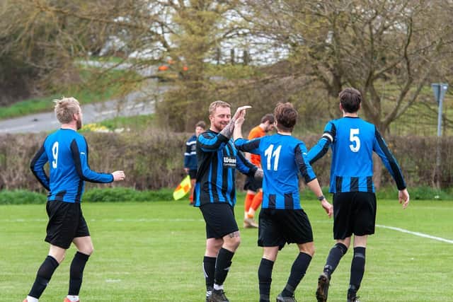Medbourne celebrate one of their goals during a 3-2 win over Spratton in Duston Garage Group B. Picture by Jim Darrah