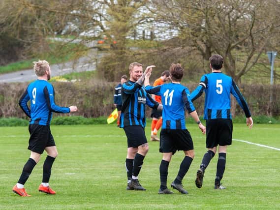 Medbourne celebrate one of their goals during a 3-2 win over Spratton in Duston Garage Group B. Picture by Jim Darrah