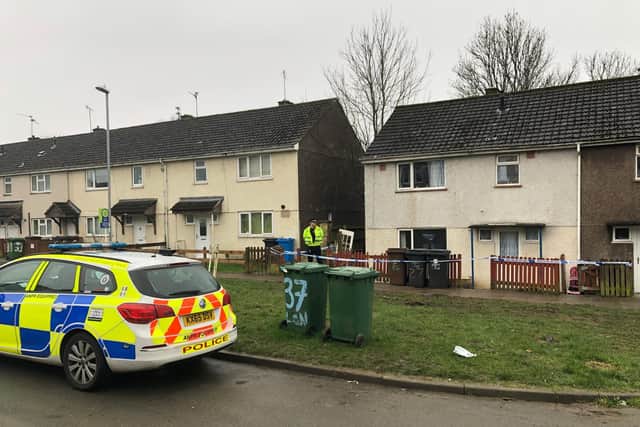 Police were still on the scene at the semi-detached house today