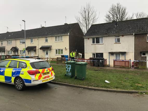 Police were still on the scene at the semi-detached house today