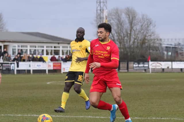 Banbury United's Luke Fairlamb goes on the attack against AFC Rushden & Diamonds