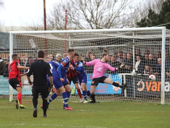 Tre Mitford opened the scoring with this effort but it was soon cancelled out as Kettering Town drew 1-1 with Gloucester City at Latimer Park. Pictures by Peter Short