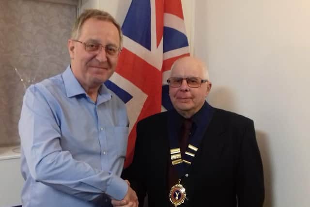 L-r Jim Doran congratulates Paul ODell
