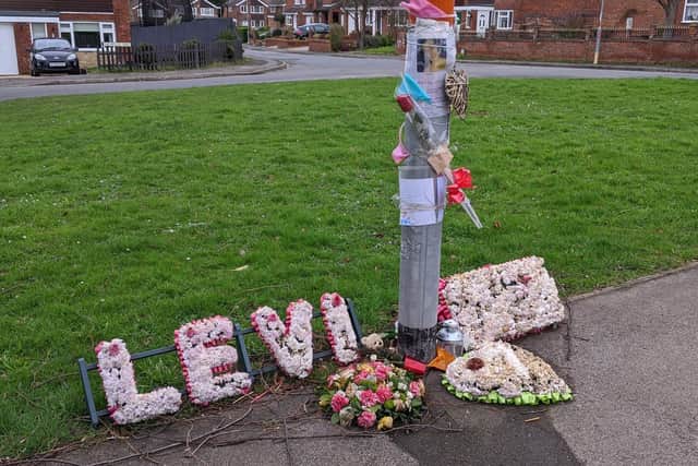 Flowers have been left at the scene in Rushden where Levi Davis was killed