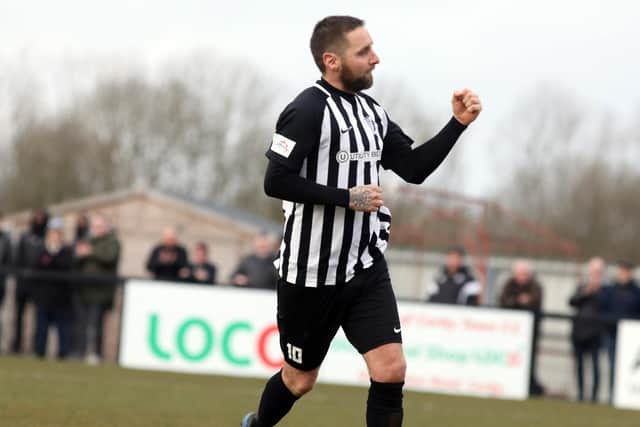 Steve Diggin celebrates one of his goals against Wantage and he now needs one more to hit a century for the Steelmen