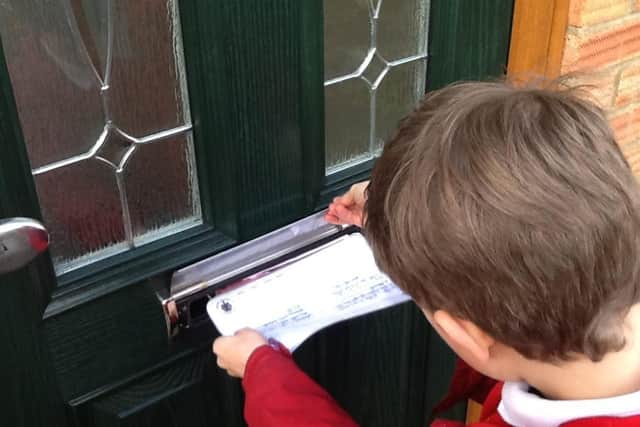 Children delivered cards to neighbours as part of their values day
