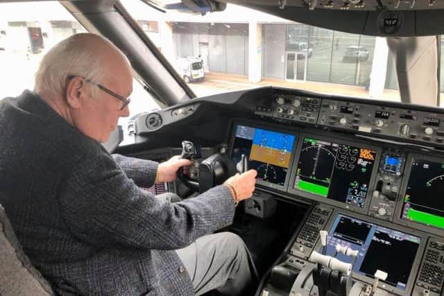 David Abel tries the captain's seat for size