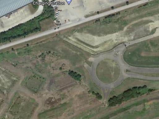 The road finishes with an unconnected roundabout.
