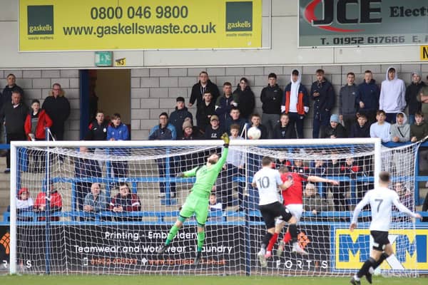 Action from Kettering Town's 3-1 defeat at AFC Telford United on Saturday. The National League North season has now been suspended. Picture by Peter Short