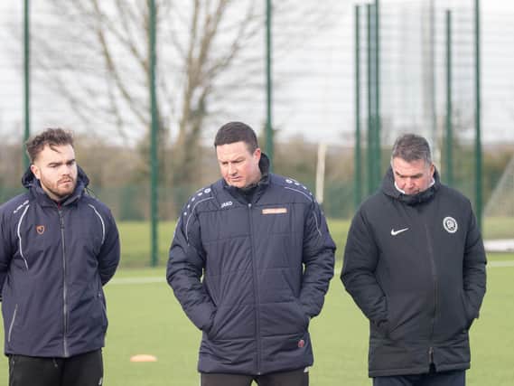 Kettering Town first-team coach Ben Marvin (left) has gone into self-isolation, manager Paul Cox has confirmed