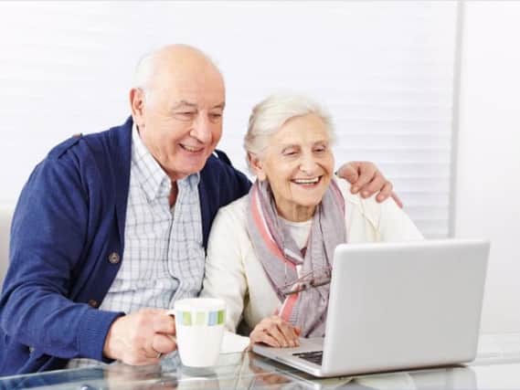 NewGen IT Services can help the elderly get online. Photo by Robert Kneschke