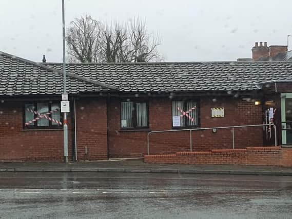 The red and white crosses have been pasted onto the windows this week.