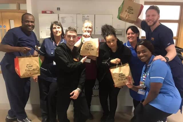 Staff from Corby Urgent Care Centre with their free Nando's