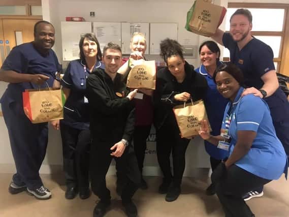 Staff from Corby Urgent Care Centre with their free Nando's