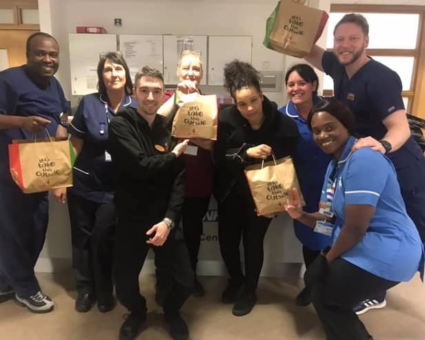 Staff from Corby Urgent Care Centre with their free Nando's